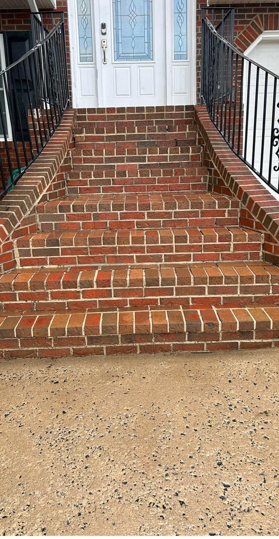 The same brick steps after washing, bright red brick and clean mortar