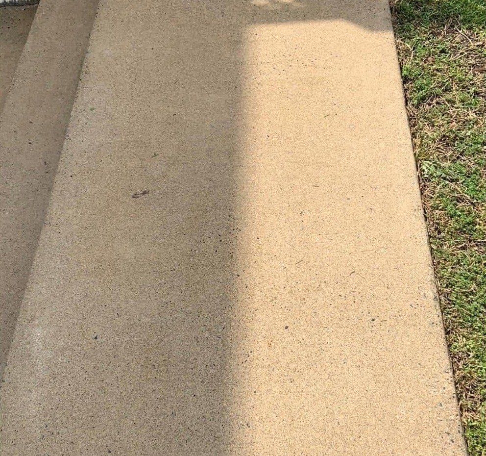 The same concrete walk clean and tan after washing